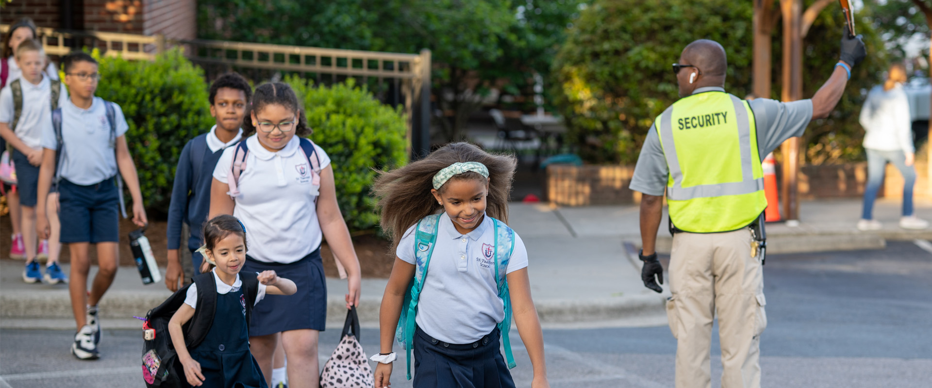 St. Timothy's students crossing the street to campus