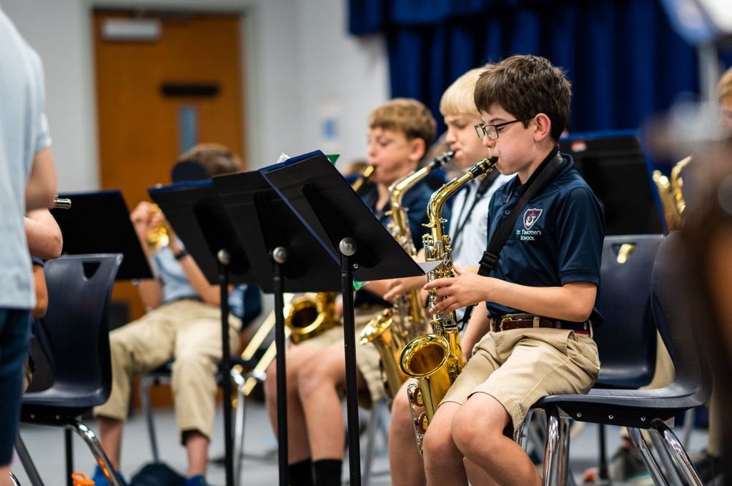 Students playing instruments in band