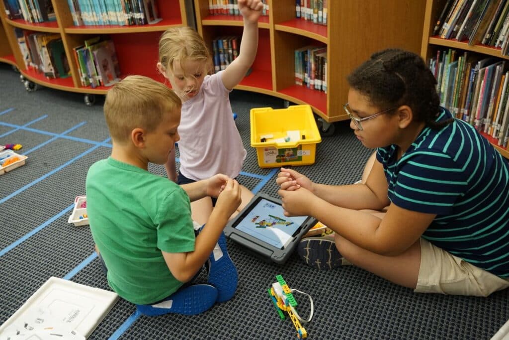 Students enjoy robotics summer camp at St. Timothy's School