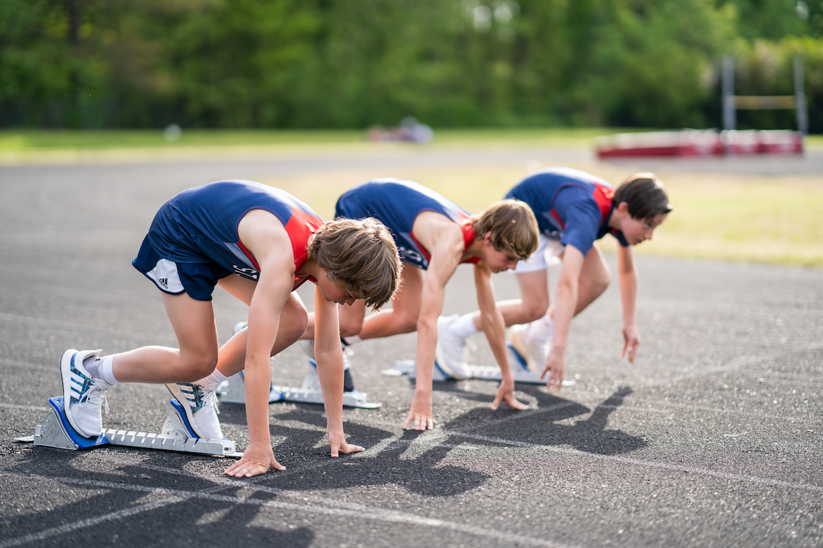 Students getting ready to run during track and field practice