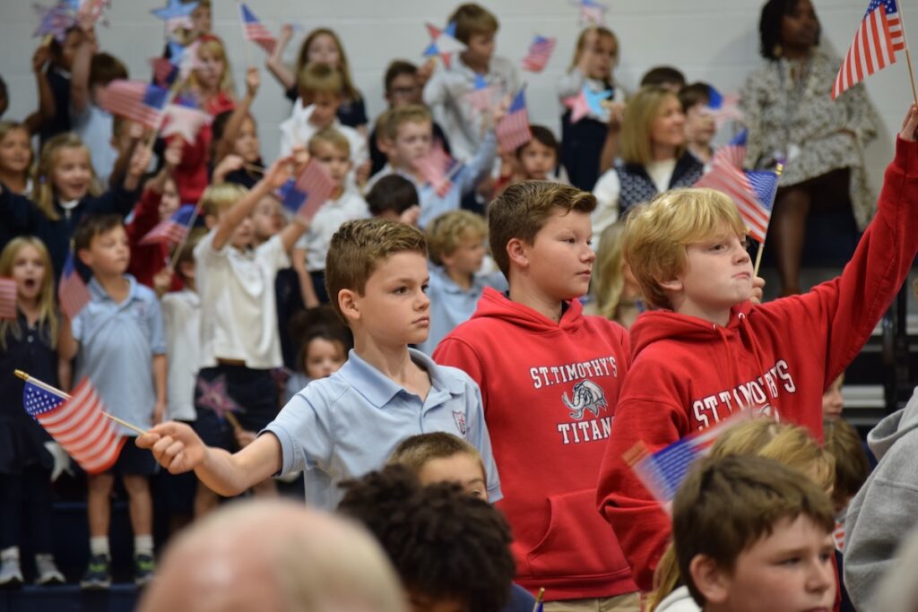 Students attending St. Timoth's Veterans Day Ceremony